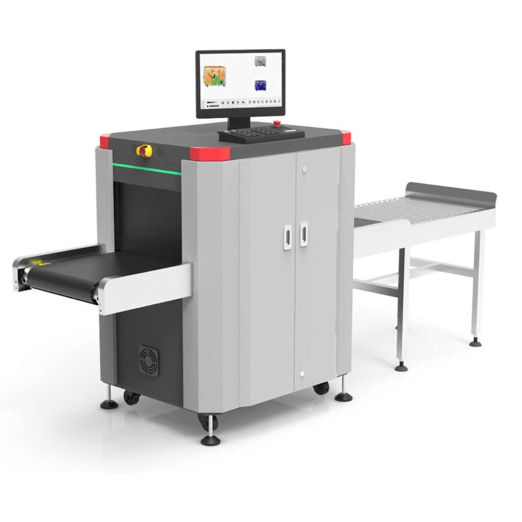 Image of x-ray baggage scanner and a monitoring system in a white background